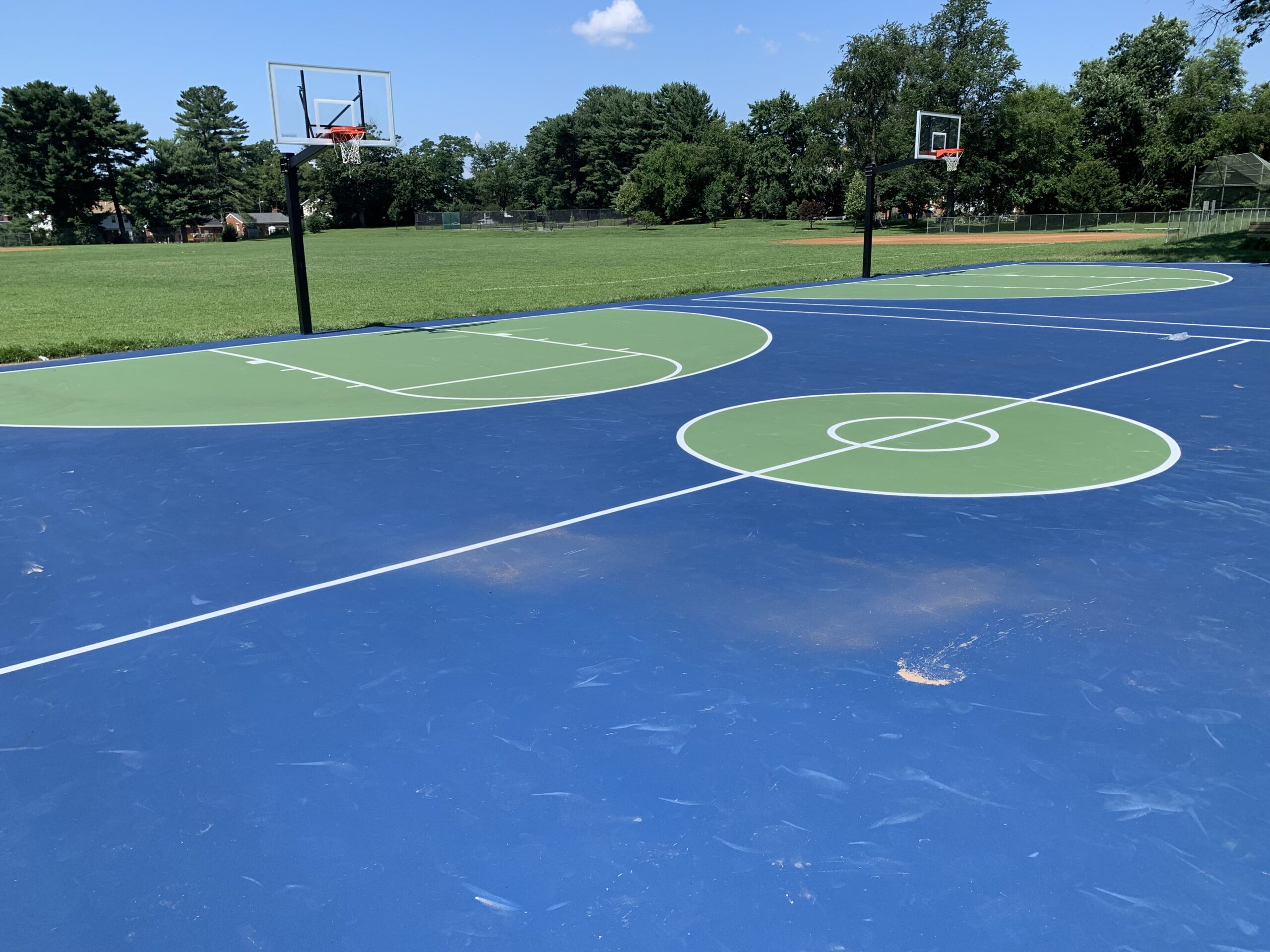 Blue and green basketball court at Wheaton Forest Local Park