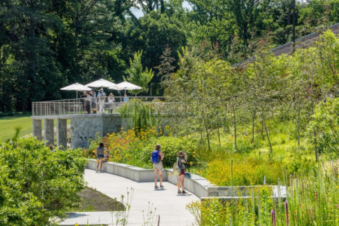 People walking along the Harry Dewey Memorial Garden at Brookside Gardens