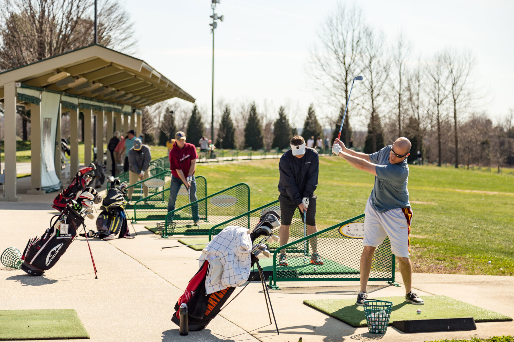 practicing golf drives 