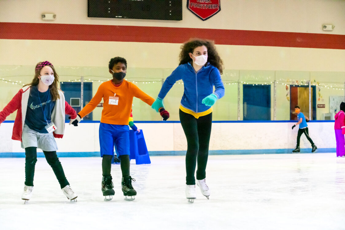 teens learning to skate at summer camp