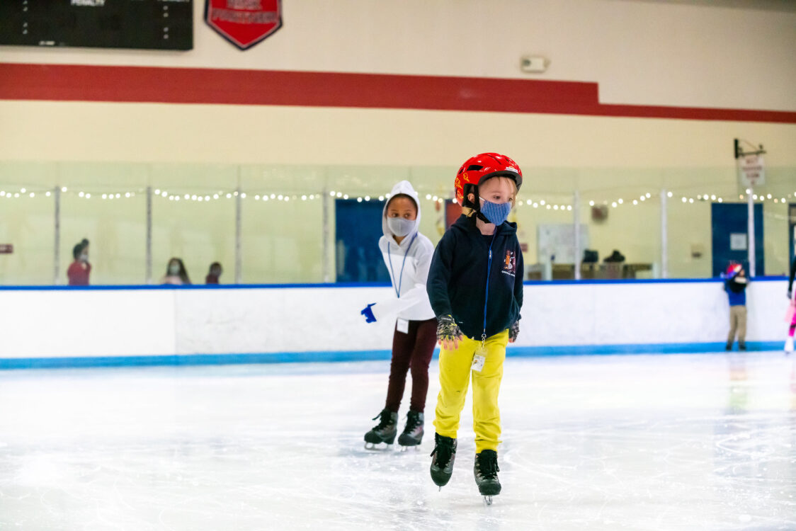 young kids learning to skate a wheaton ice