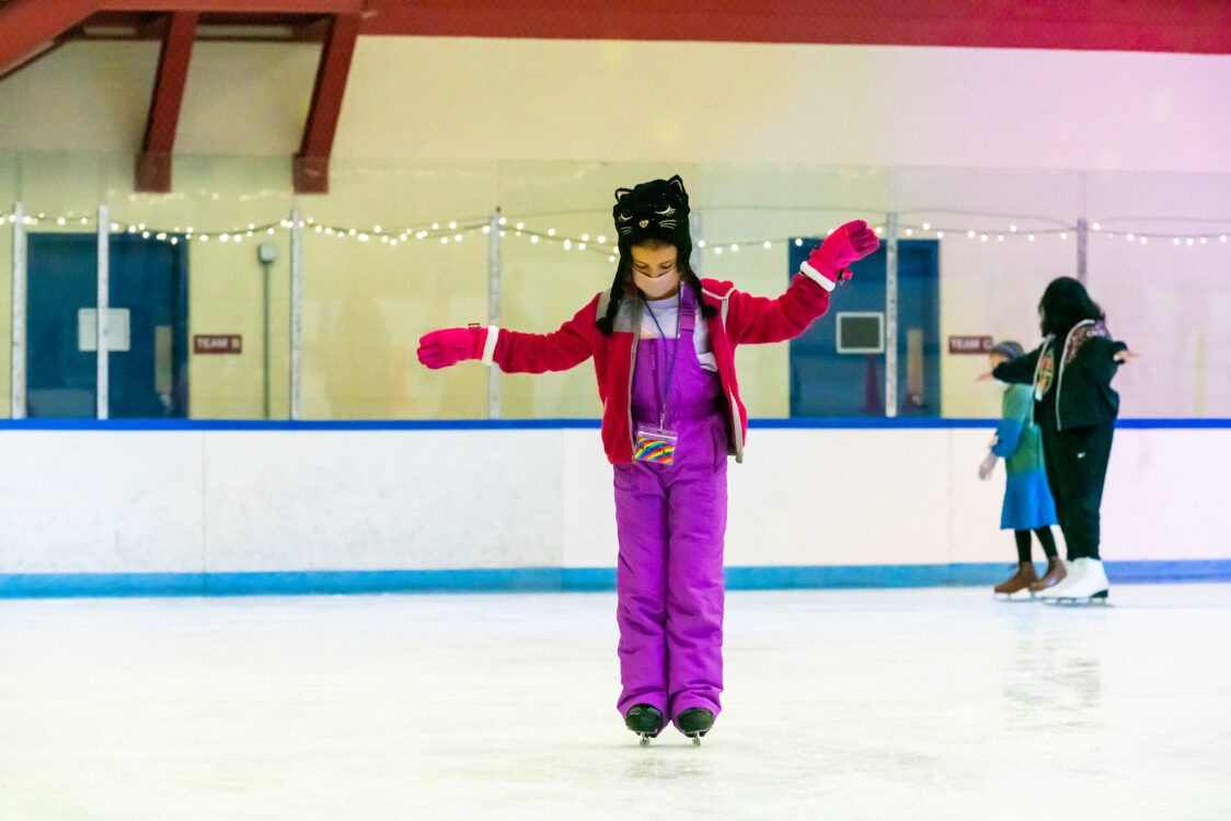 child learning how to skate