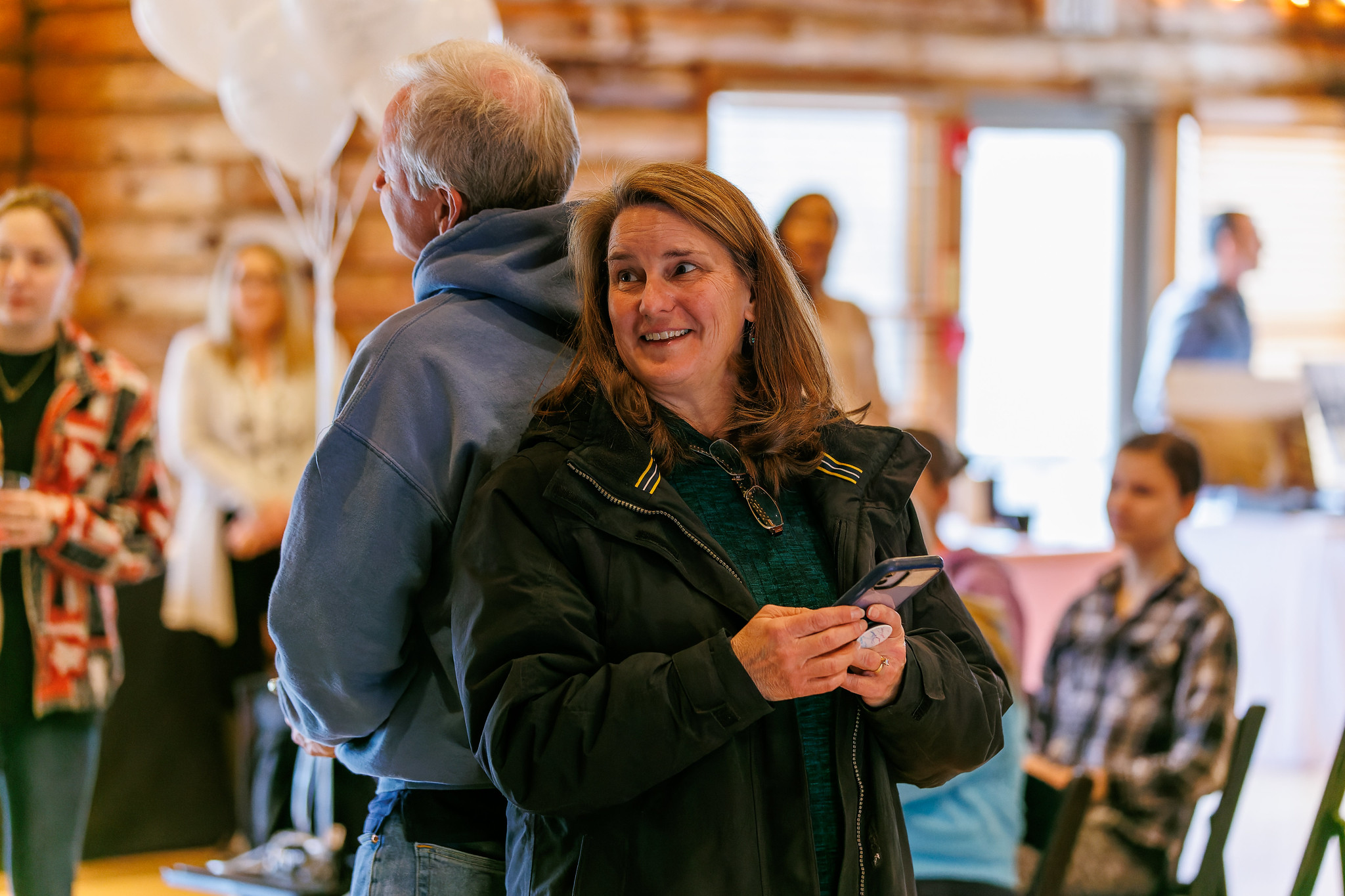 couple watching presentation at Seneca Lodge Winter Open House