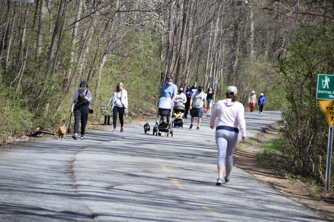 People walking on Little Falls Parkway