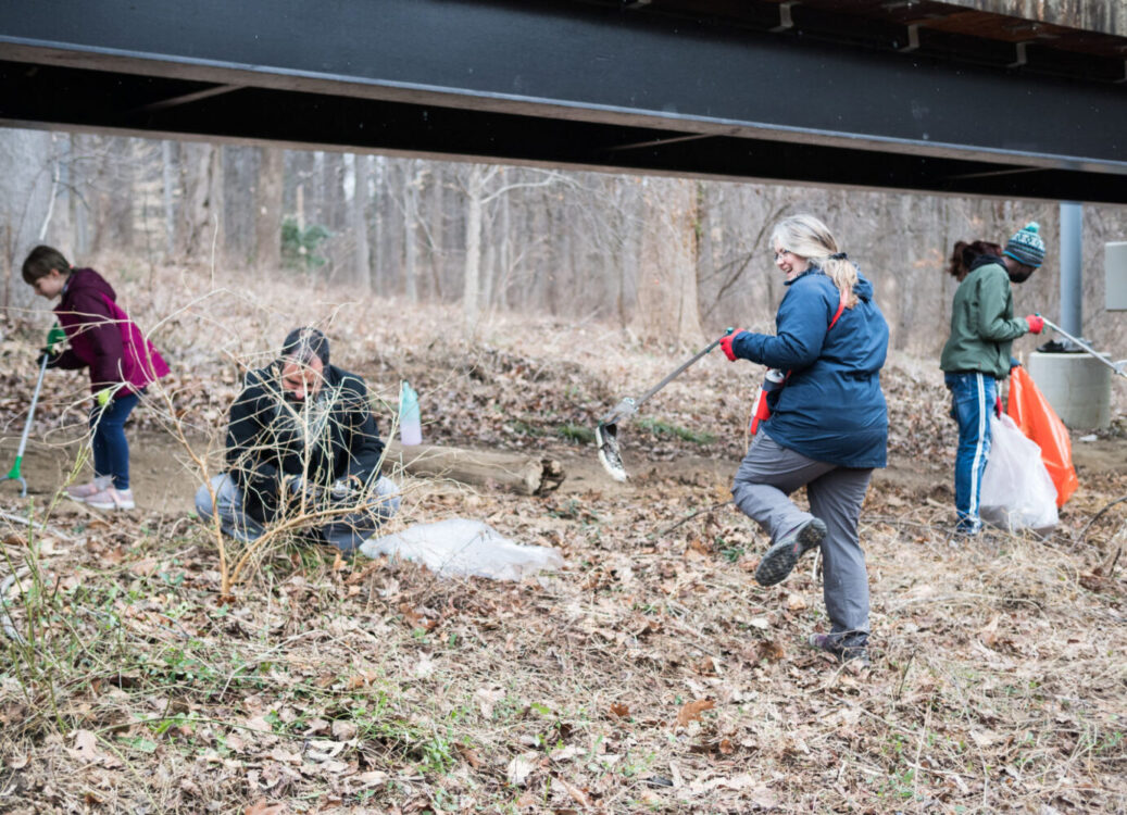 volunteers picking up trash