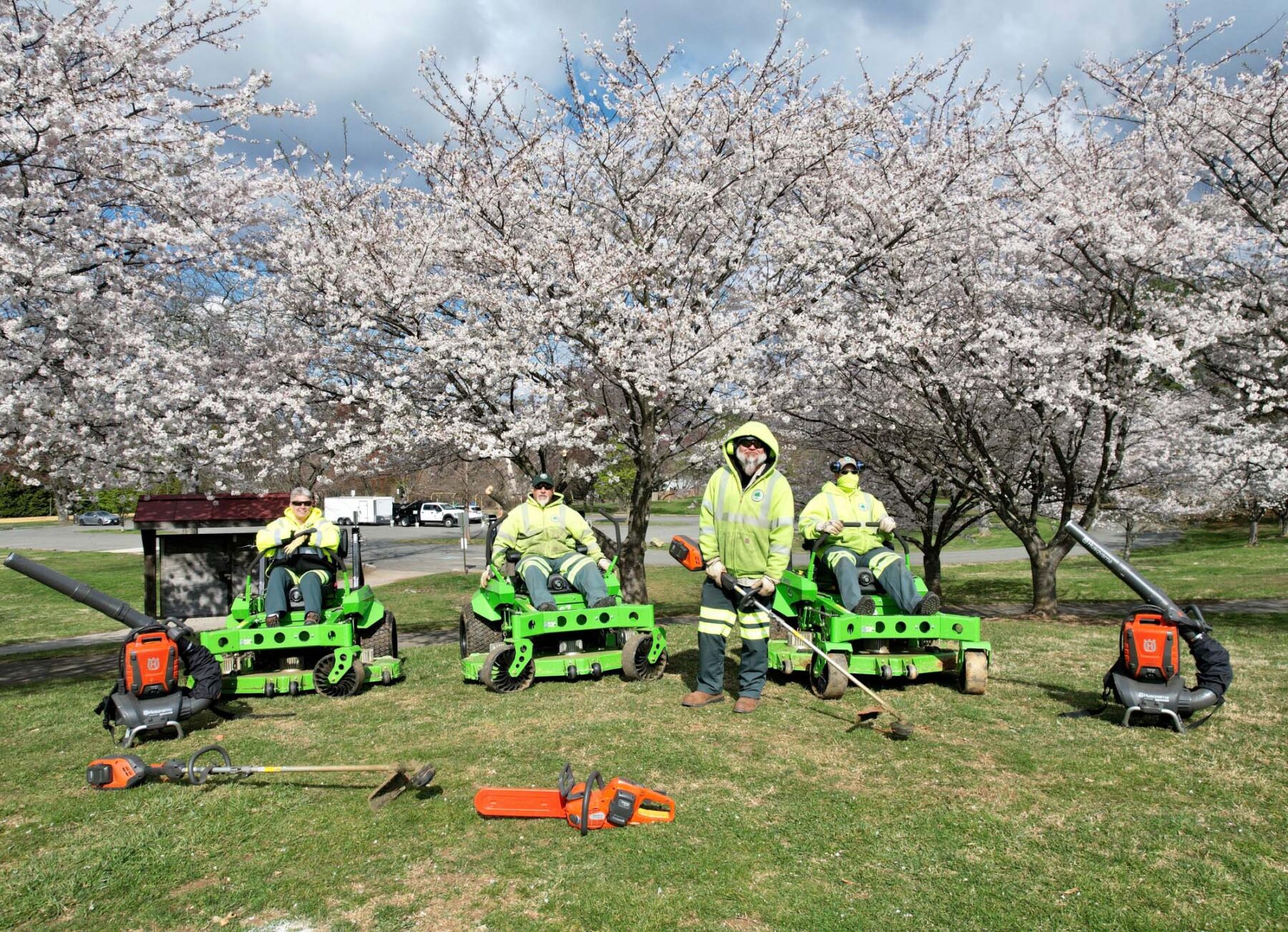 park staff with electric equipment