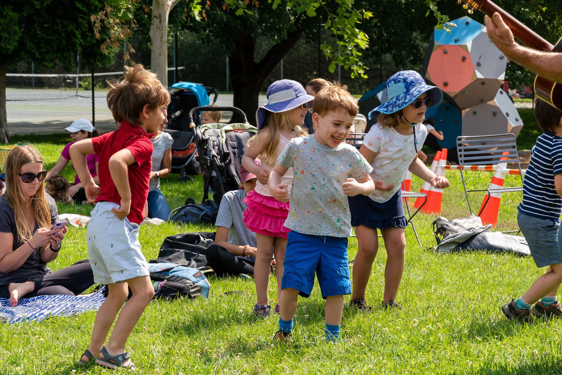 children dancing outside