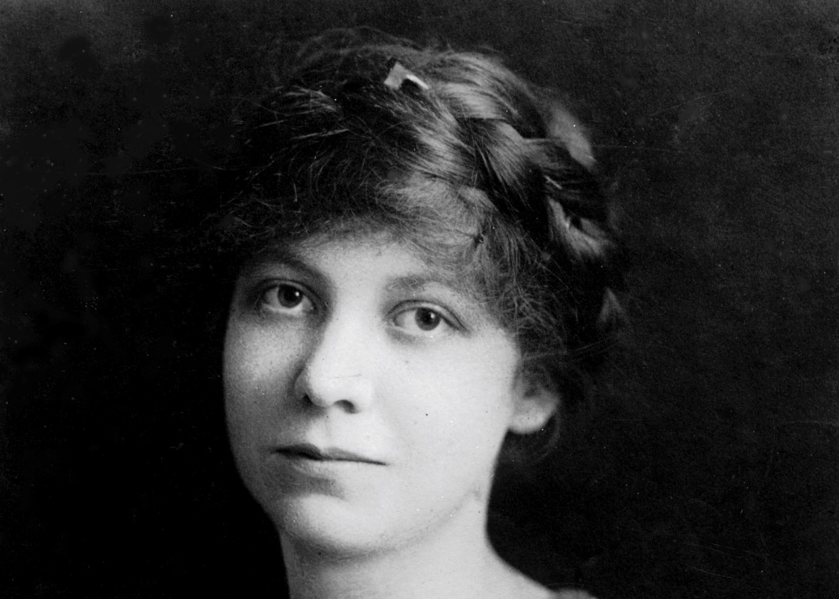 Black and white photograph of Lavinia M. Engle as a young woman. Her hair is in a braid, wrapped around her head.