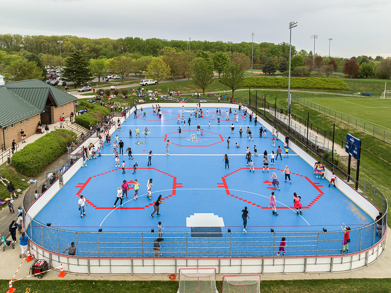 inline rink at ridge road with various roller skaters on it at roller disco 2023