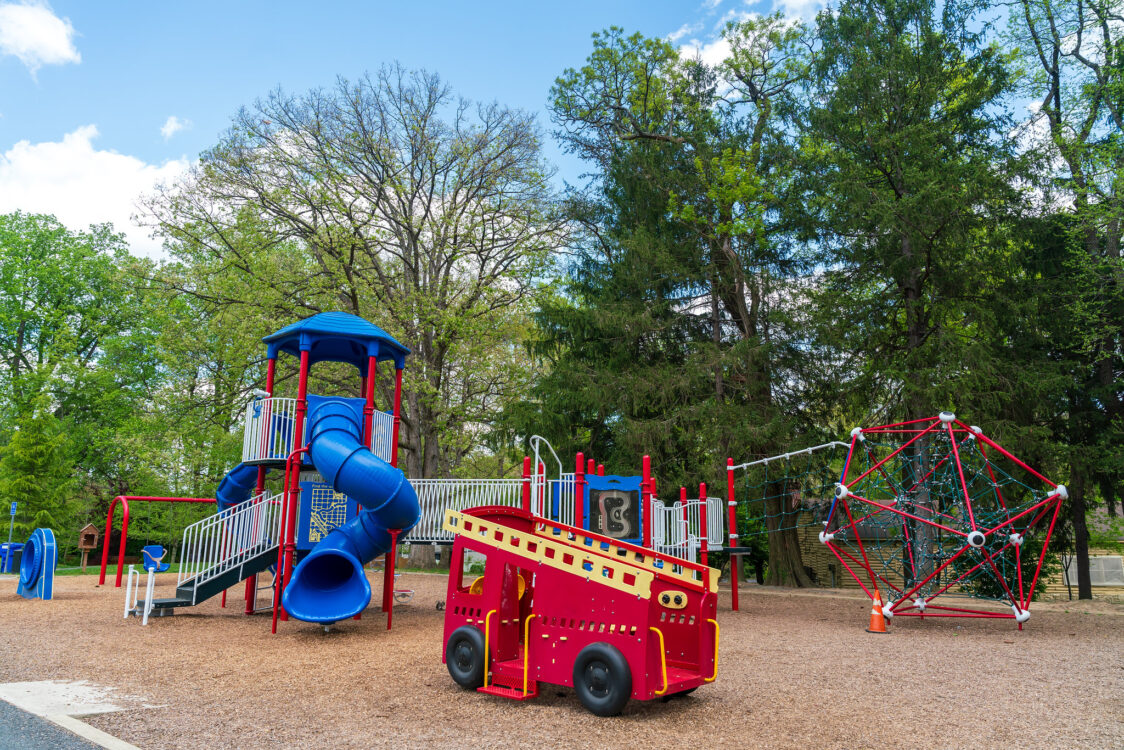 Red and blue playground at North Four Corners Local Park