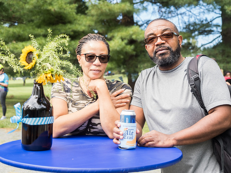 couple enjoying a beer at the alt trail