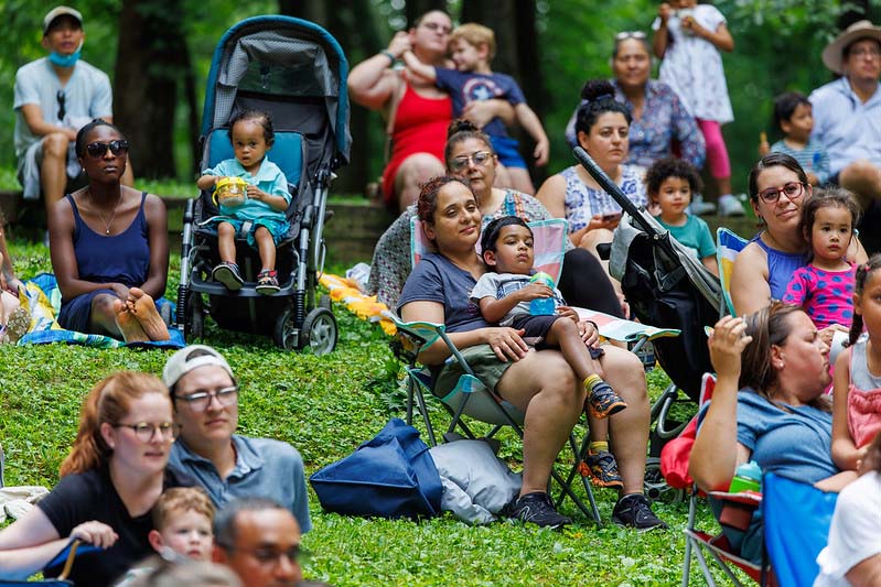 crowds watching the Happenstance Theater production in summer of 2023