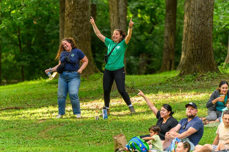 two park visitors dancing at Montgomery parks  summer concert