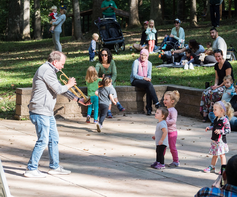 band playing to kids dancing at Sunday Serenade April 2024 Cabin John Regional Park